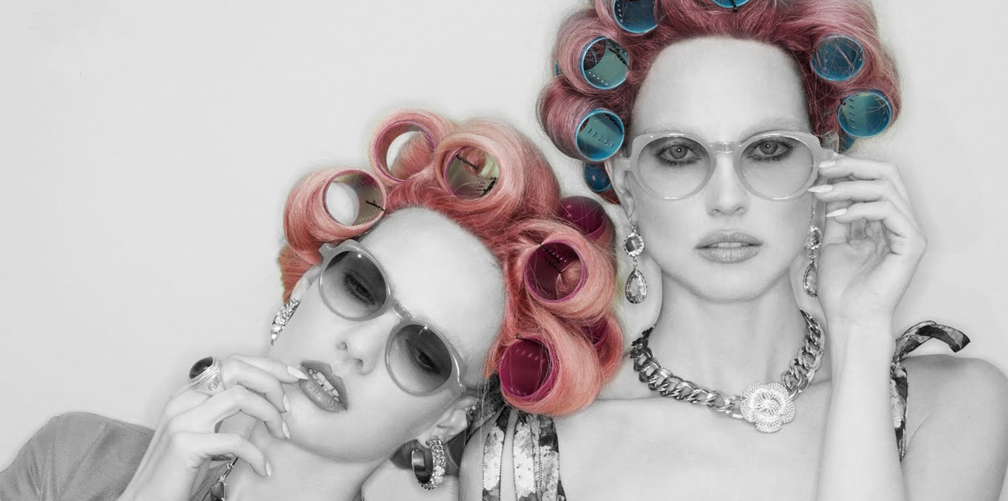 this is a fashion photography about two women perm their hair.